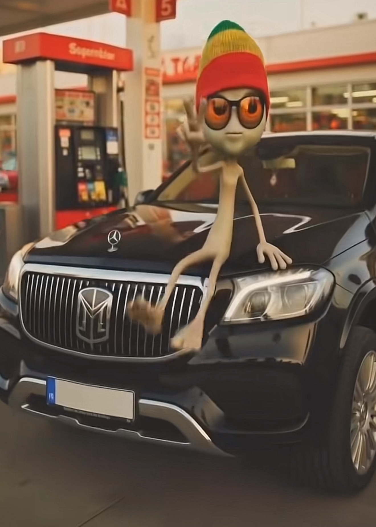 Eeffoc the alien posing on his Maybach at a gas station